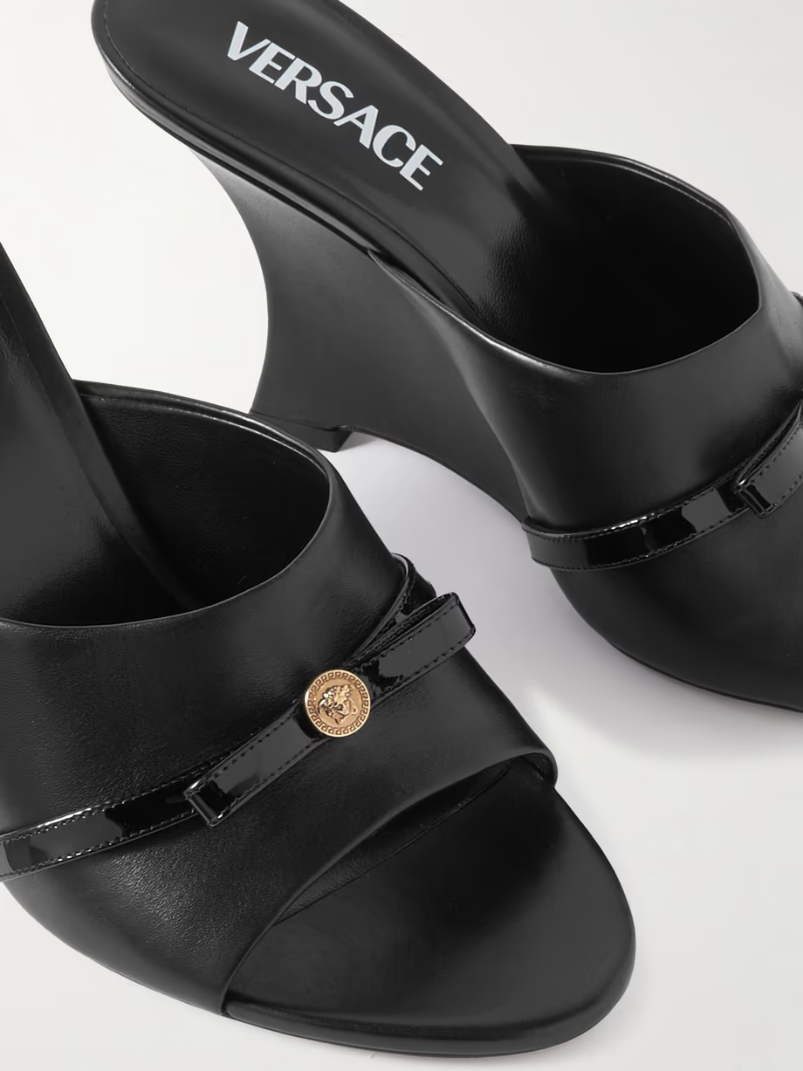 Bow-embellished leather mules Bow-embellished leather mules