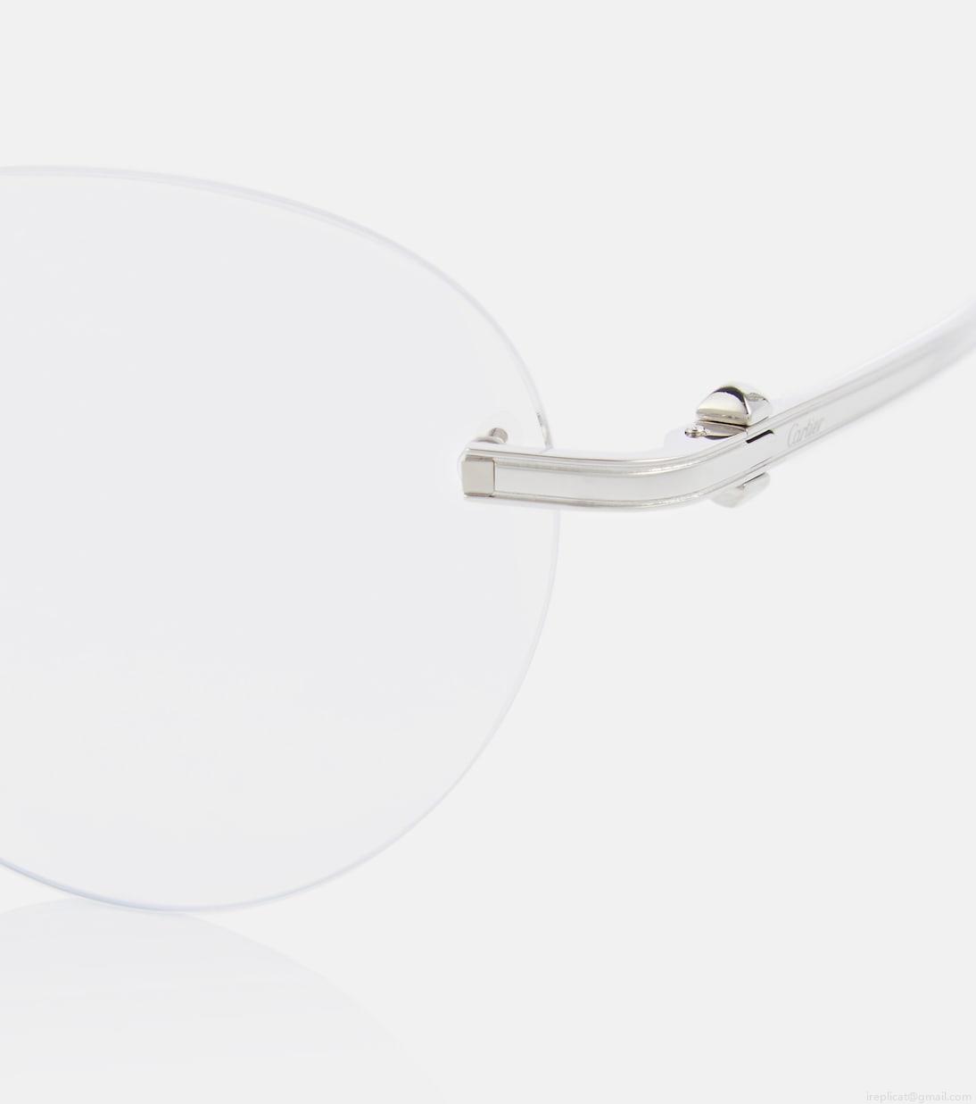 Cartier Eyewear CollectionPasha de Cartier round glasses Cartier Eyewear CollectionPasha de Cartier round glasses