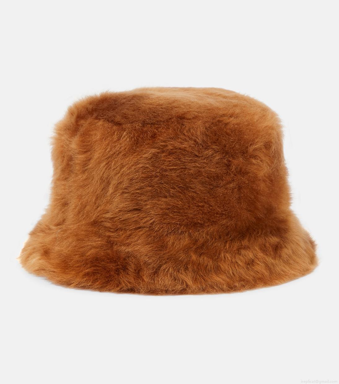 Loro PianaReversible shearling bucket hat Loro PianaReversible shearling bucket hat