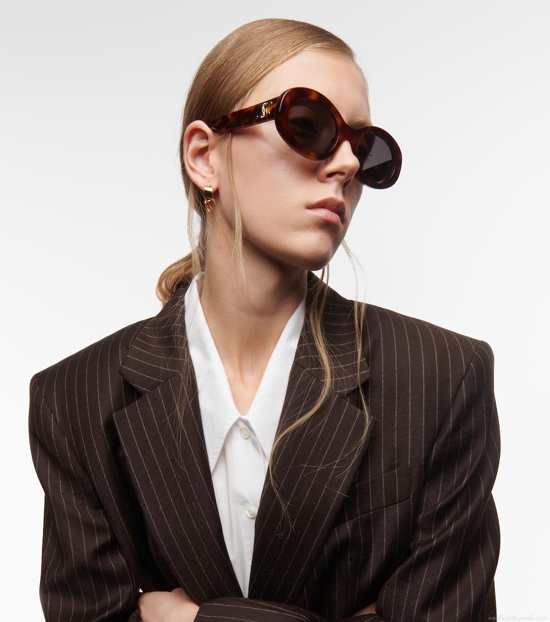 Celine EyewearTriomphe 01 oval sunglasses Celine EyewearTriomphe 01 oval sunglasses